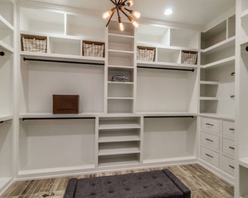 Modern light fixture in center of walk-in closet